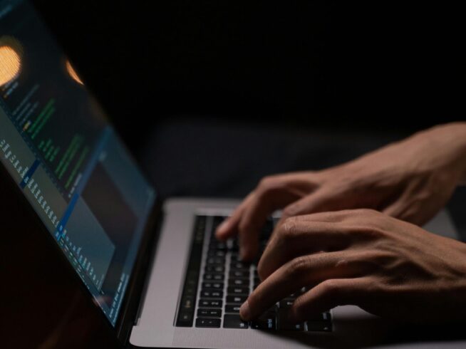 person-using-silver-and-black-laptop-computer